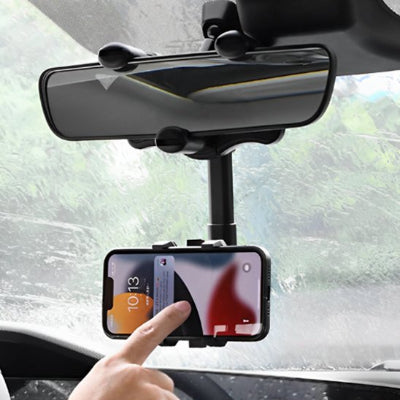 Support téléphone voiture retroviseur position de face avec une main sur portable